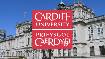 Cardiff University logo in English and Welsh overlaid on an image of the university's historic main building.