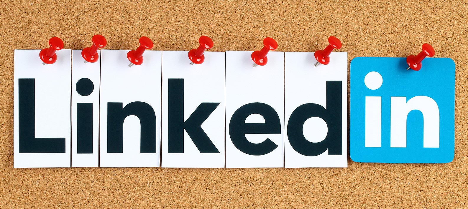 LinkedIn letters and logo on pinboard